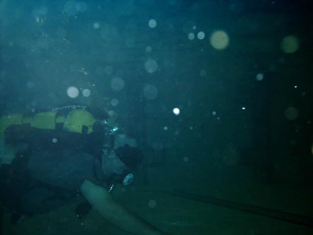 Diver practicing search with blackout mask